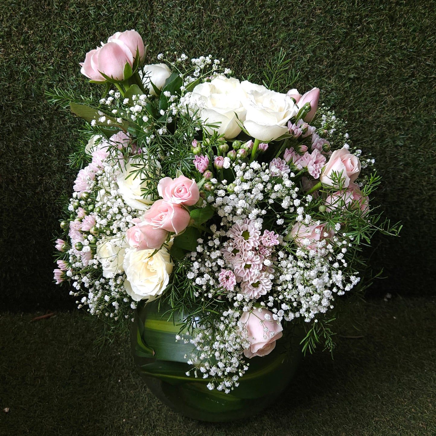 "Sprinkle of Blush" Floral Arrangement In Glass Vase