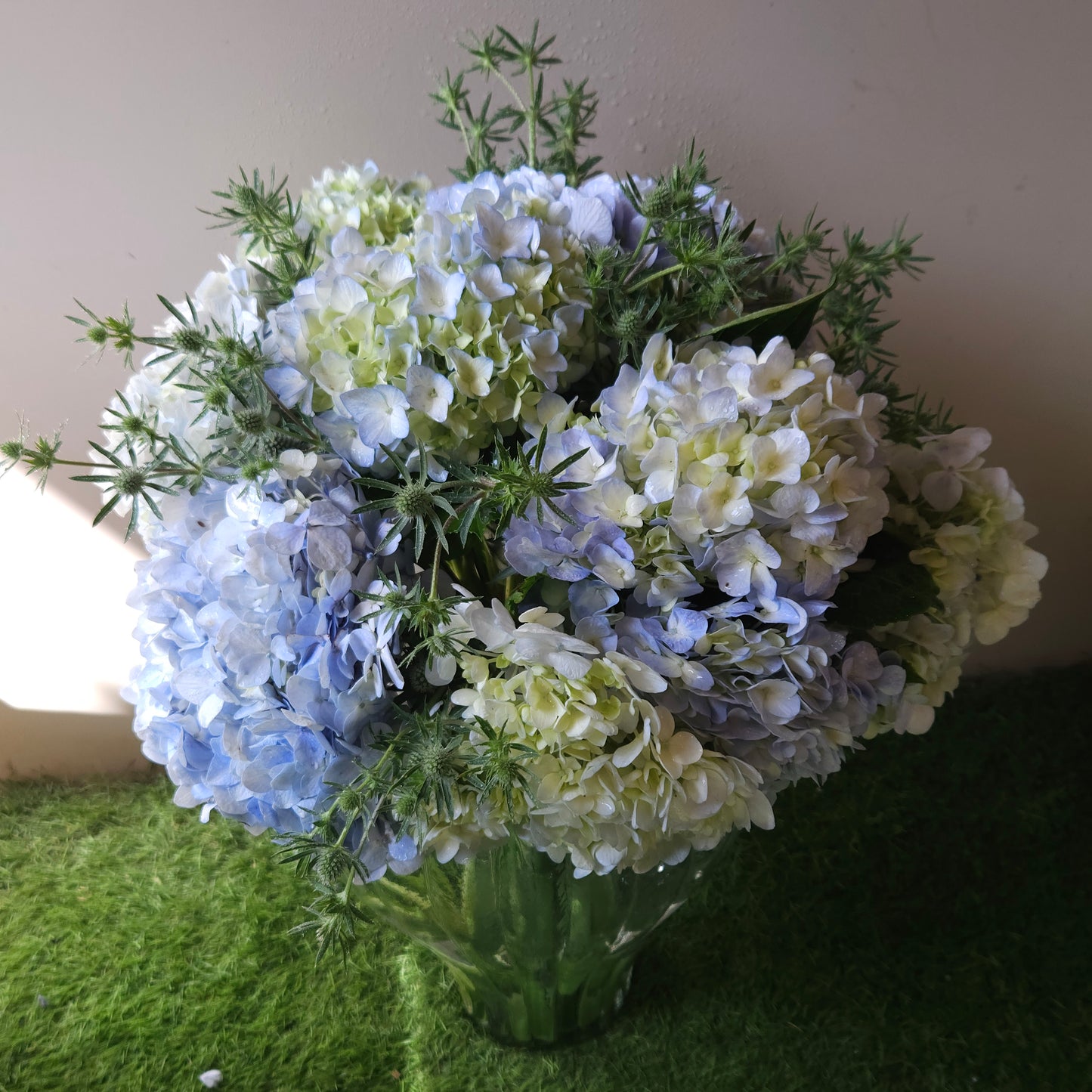 "Blown Away" Floral Arrangement In A Glass vase
