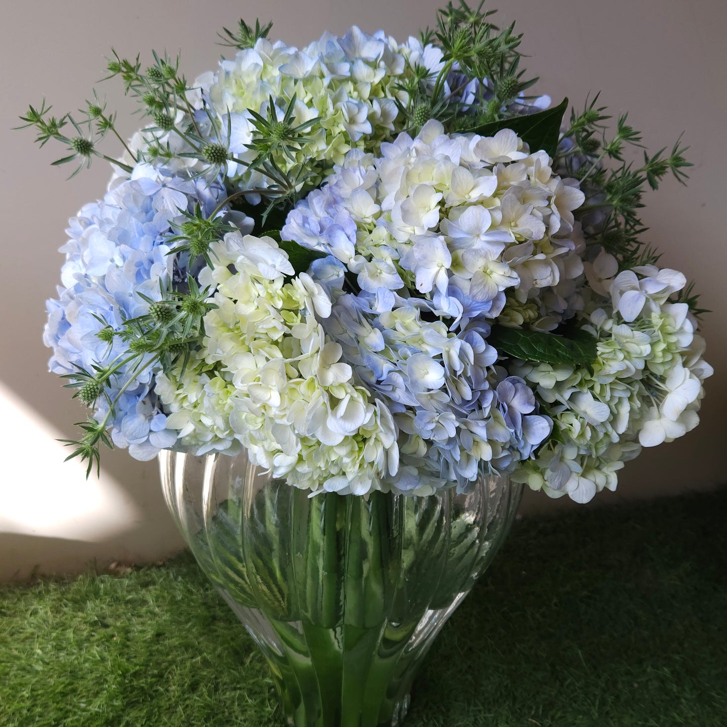 "Blown Away" Floral Arrangement In A Glass vase