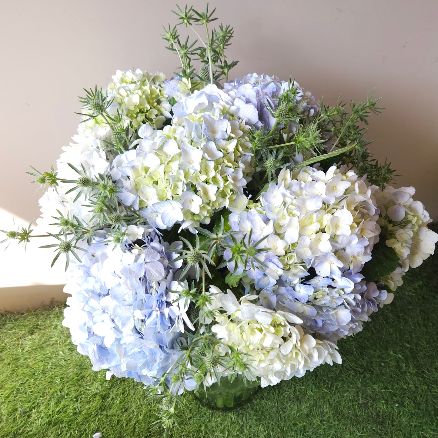 "Blown Away" Floral Arrangement In A Glass vase