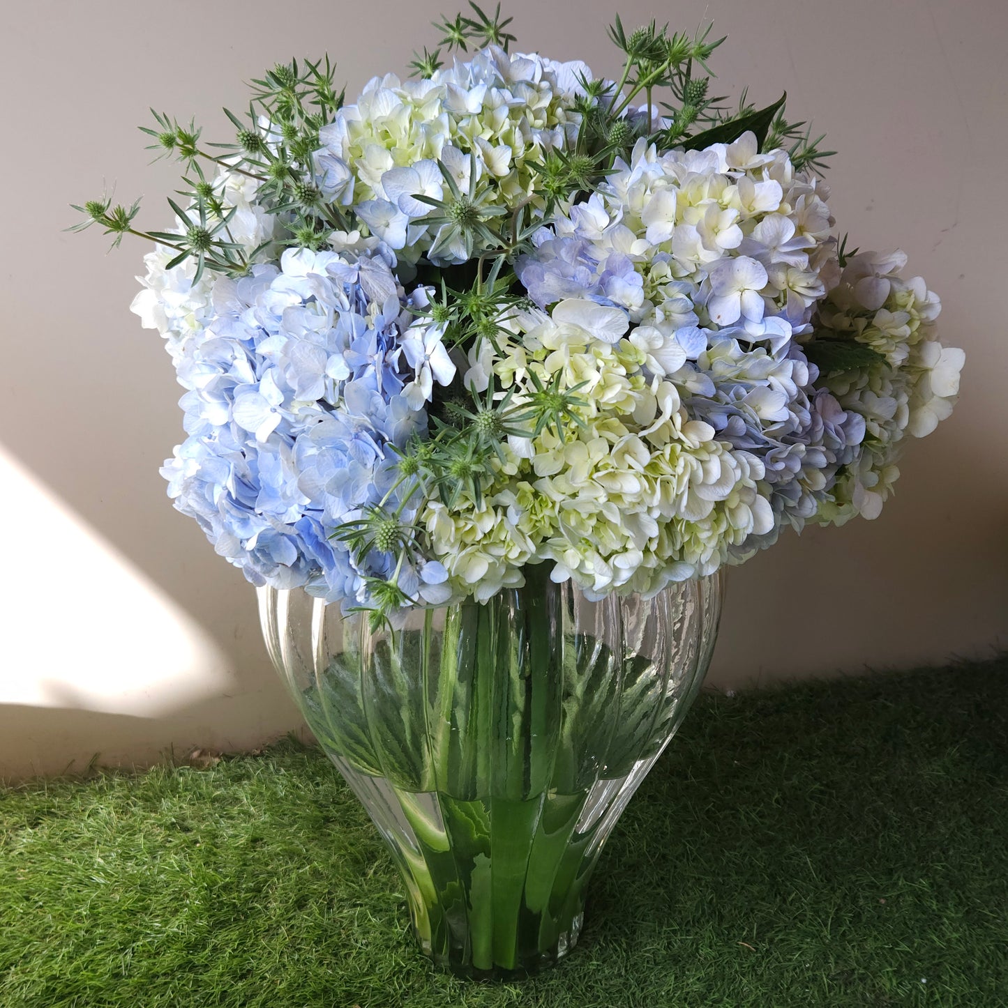 "Blown Away" Floral Arrangement In A Glass vase